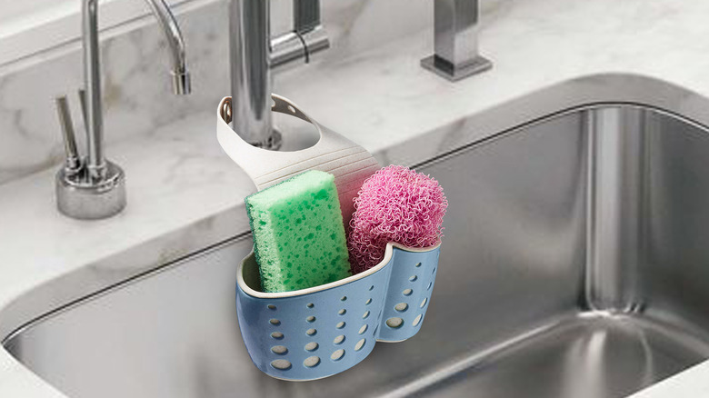 clean sponges drying in caddy