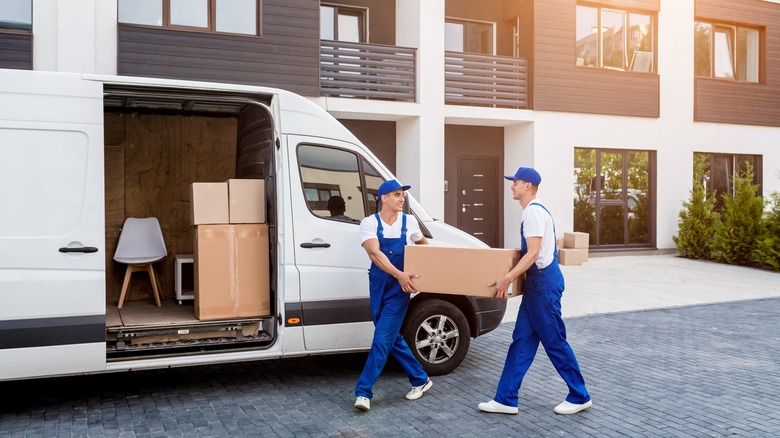 movers packing a van