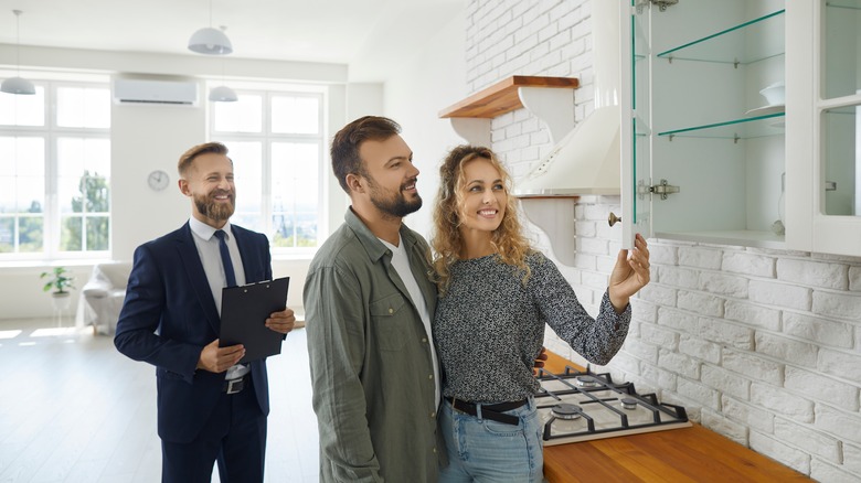 realtor showing a home