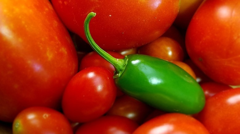 green jalapeno and red tomatoes