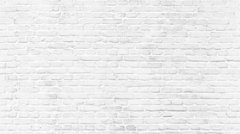 whitewashed brick wall