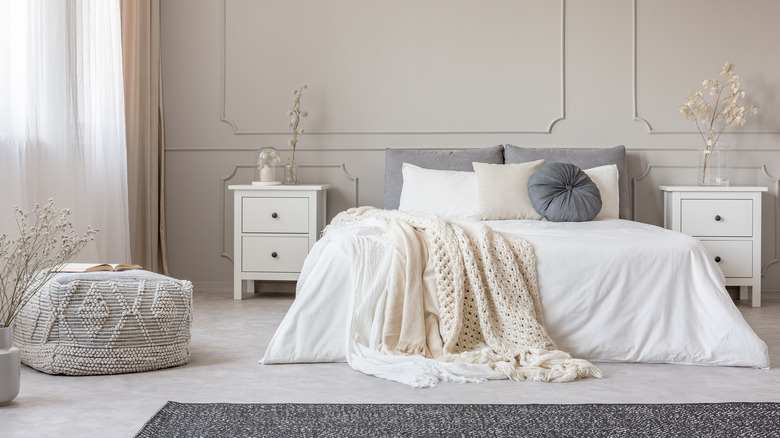 neutral wall molding accent wall in bedroom