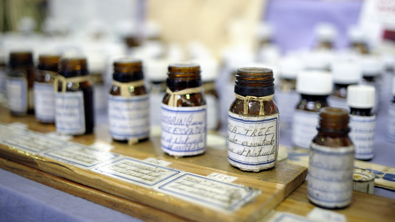 row of essential oils in bottles