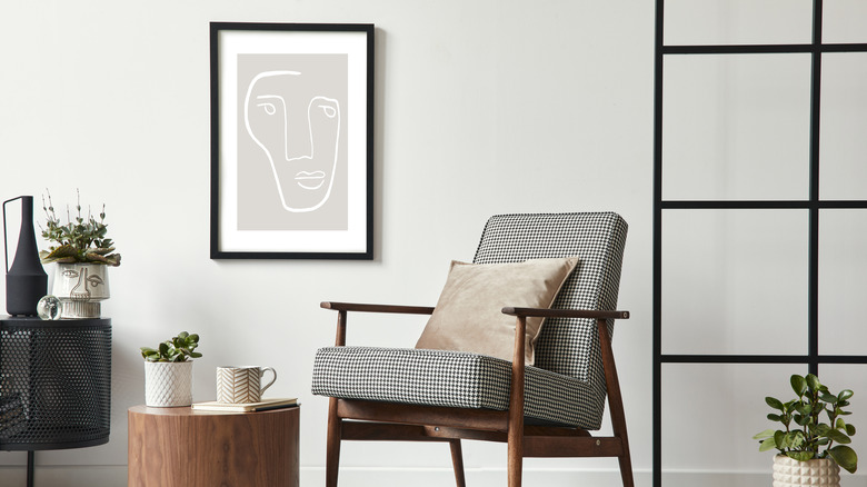 Framed art print and chair