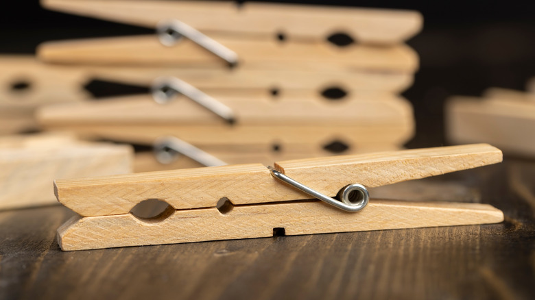 Several wooden clothespins