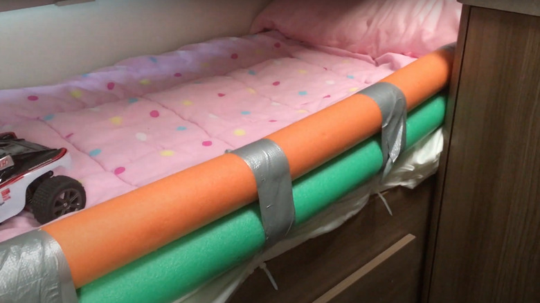 Pool noodle bed rail