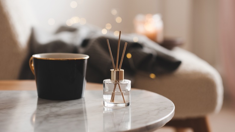 candle and diffuser in bedroom