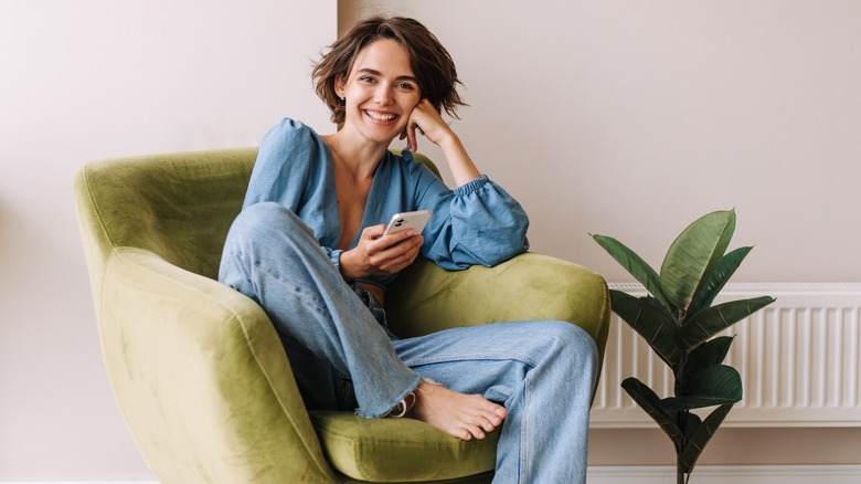 Woman sitting in chair