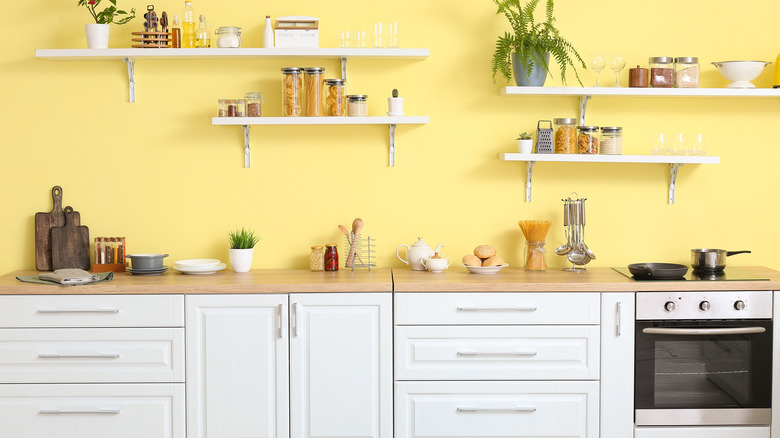 Clean and cute yellow kitchen