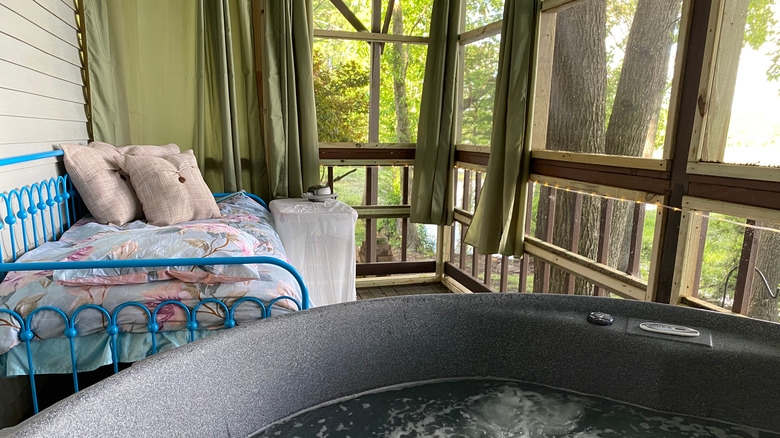 A daybed on a porch