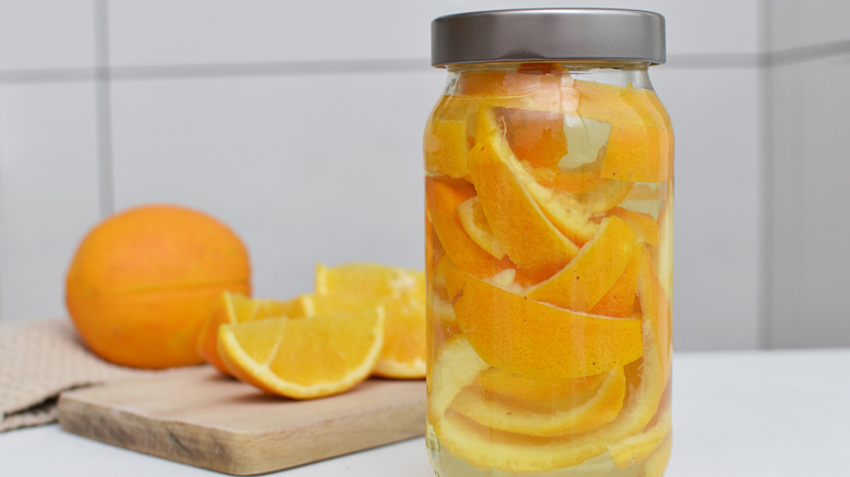 orange peels and vinegar jar