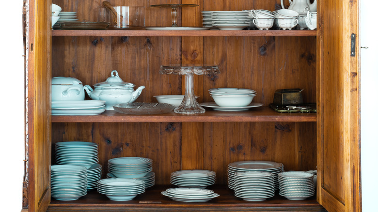 plates stacked on shelves