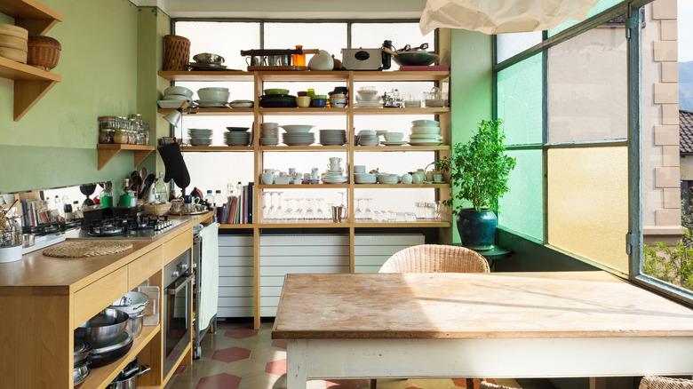 dishes stacked on shelves