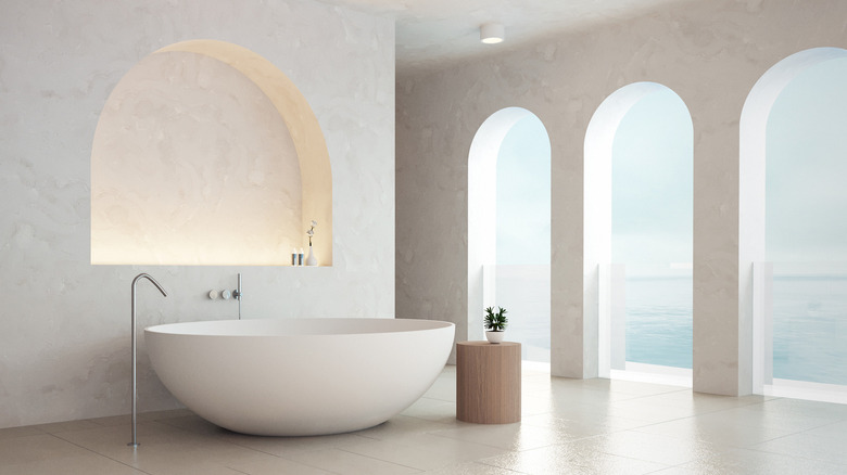 Bathroom with open archway windows