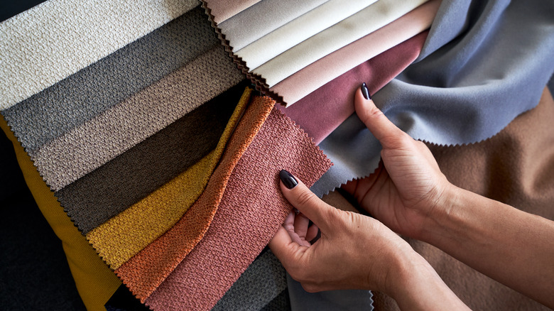 Woman handling upholstery samples