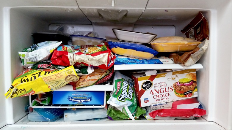 messy freezer full of food