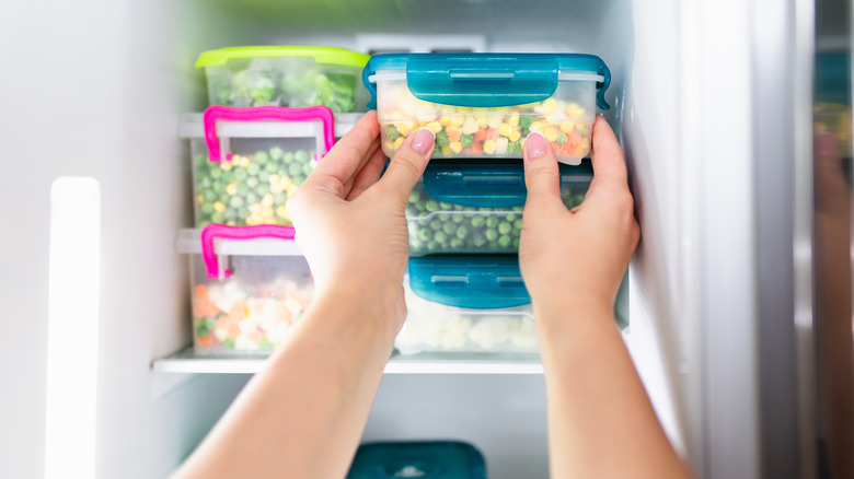 putting frozen foods away neatly