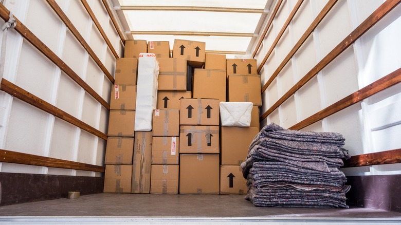 Stacked moving boxes inside truck