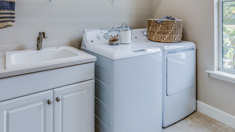 Laundry room cabinet-mounted sink 