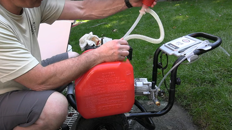 Removing gas from pressure washer