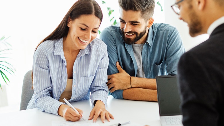 couple signing contract