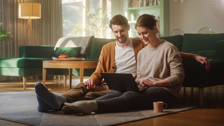 couple watching laptop