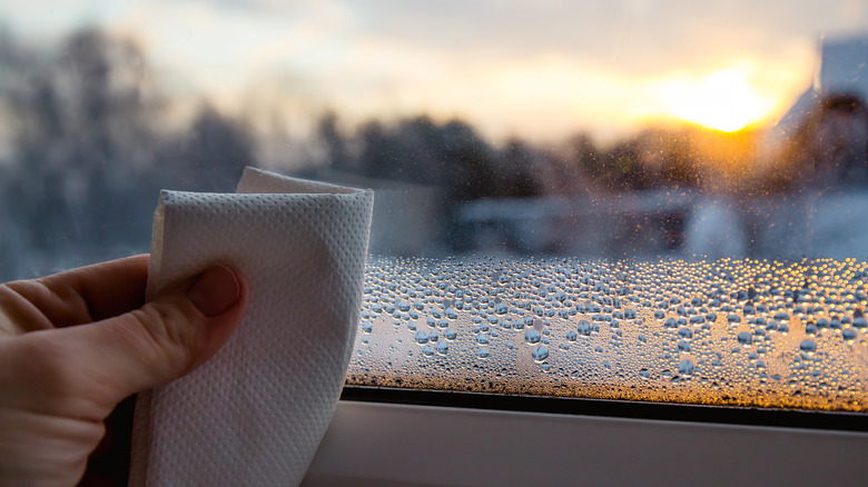 wiping away condensation