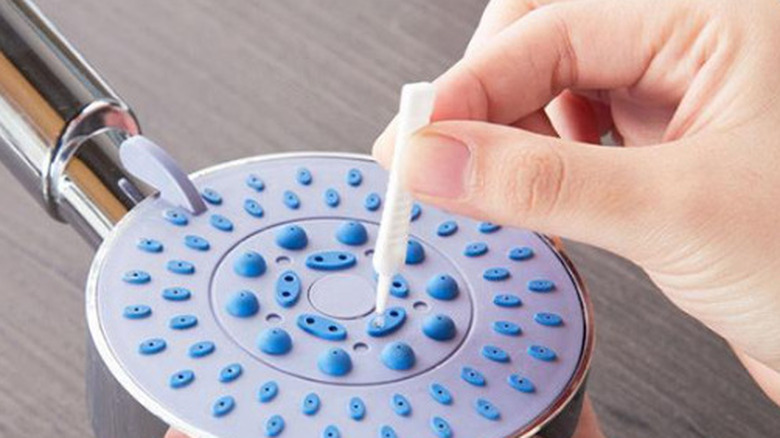 cleaning showerhead holes