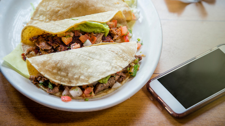 cell phone on dining table