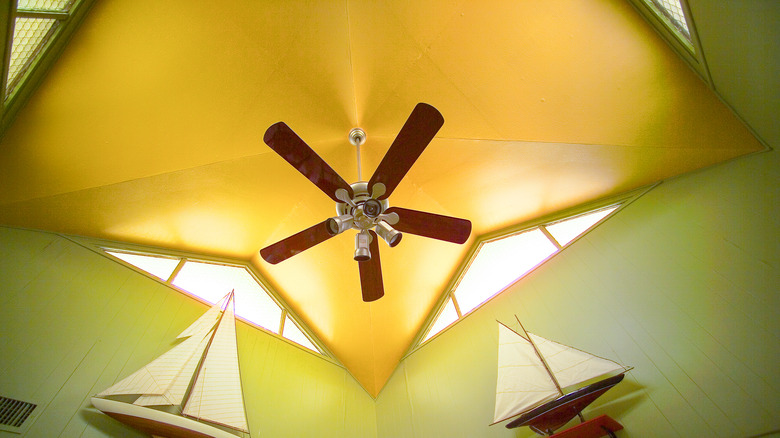 Fan hanging from cathedral ceiling