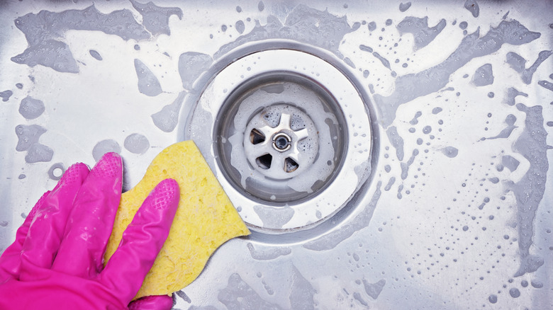 Scrubbing a sink drain