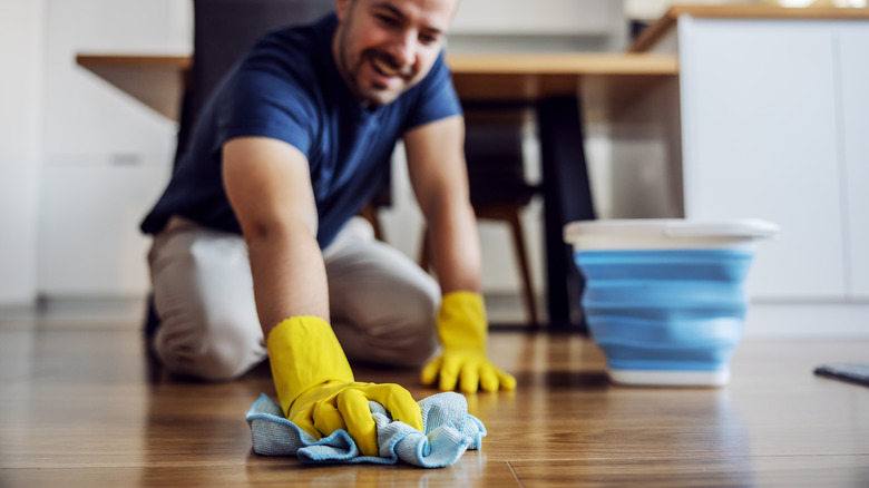 Someone cleaning the floor