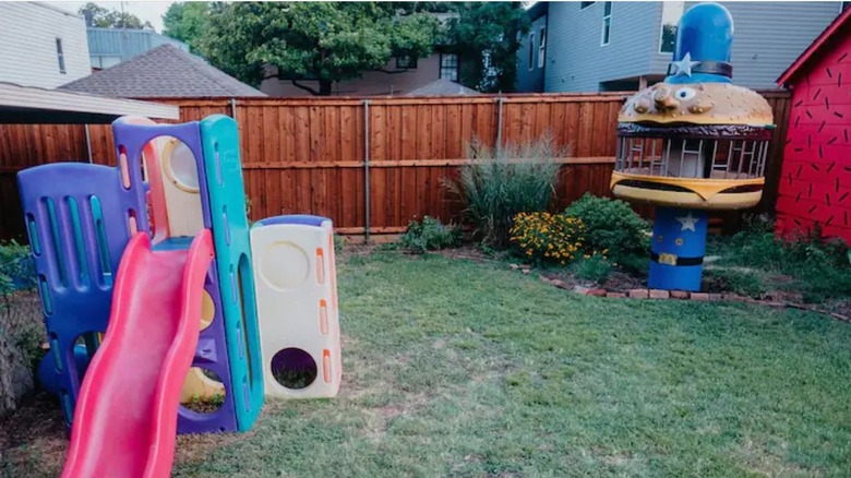 backyard with playground equipment