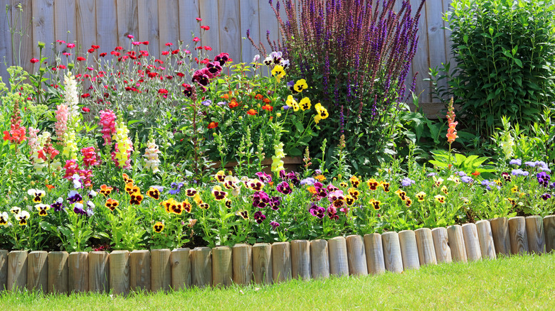 small logs around a garden