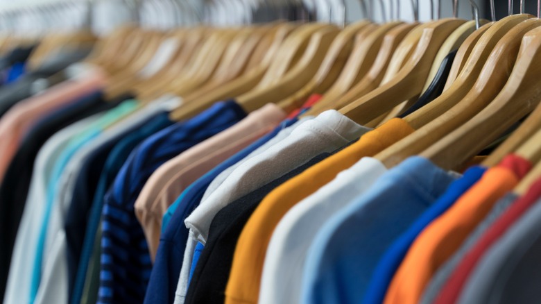 old t-shirts hanging on rack