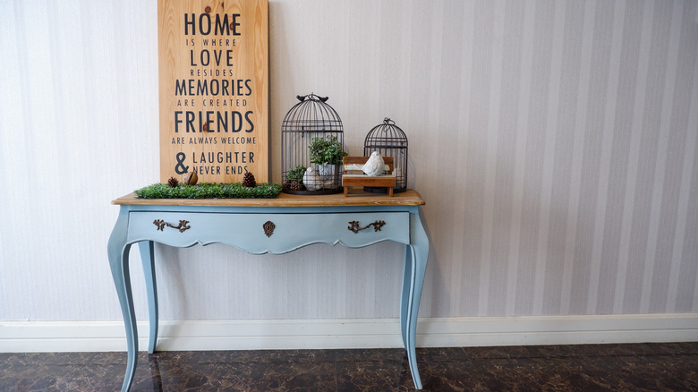 metal bird cages on table