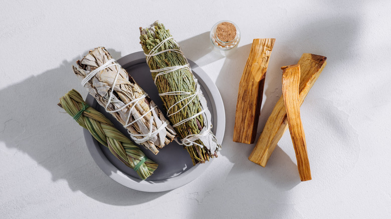 selection of herbs, sage, sweetgrass