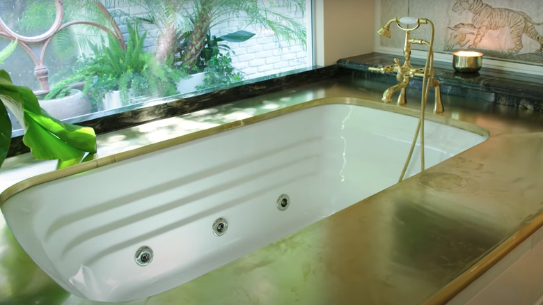 gold and white bathtub 