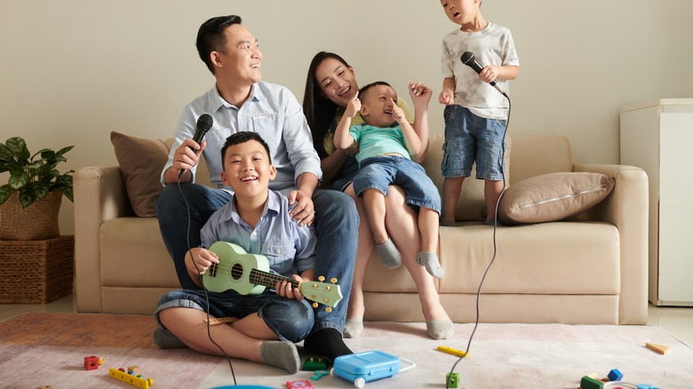 family playing in living room