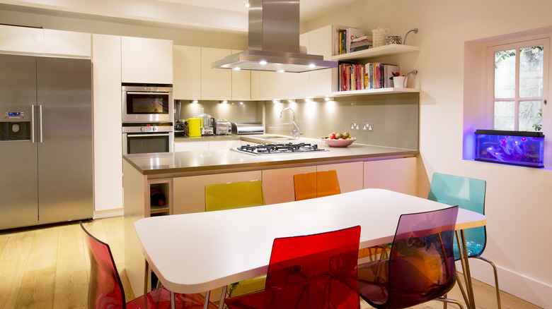 kitchen with colorful chairs