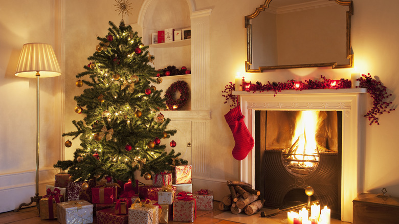 Christmas tree by fireplace 