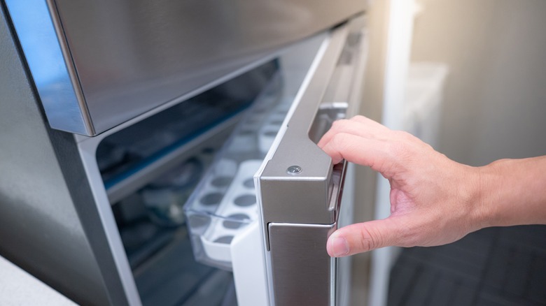 opening freezer door