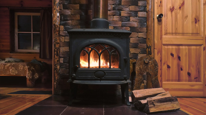 wood burning fireplace with brick