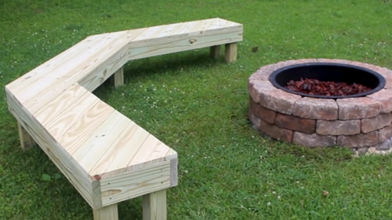 rounded garden bench around fire pit