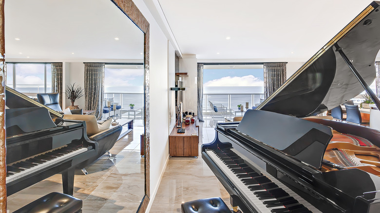 large wall mirror and piano