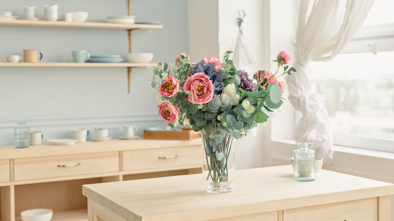 pretty bouquet on pine kitchen