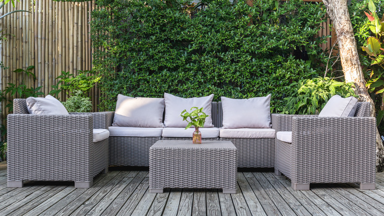 living wall behind outdoor couch