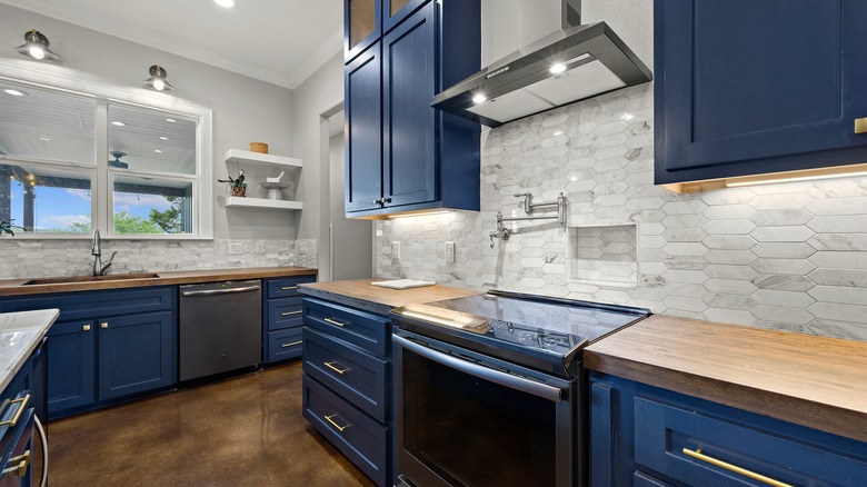 kitchen with blue cabinets