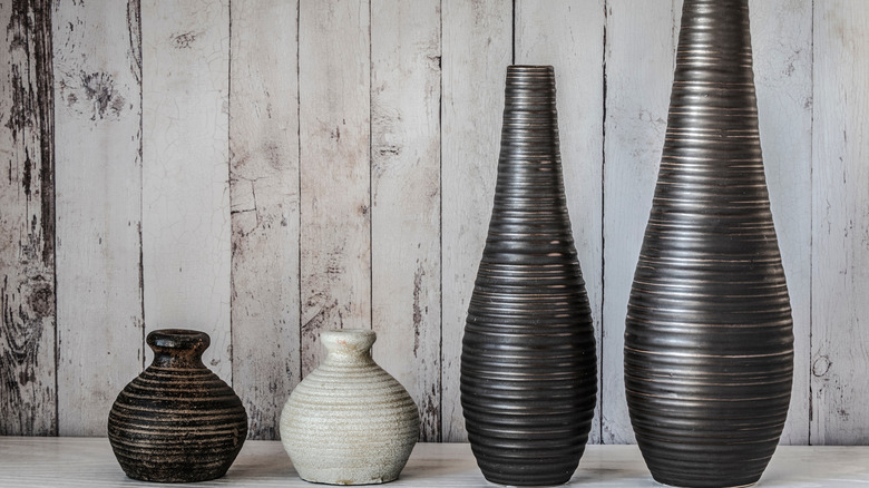 contrasting black and white vases