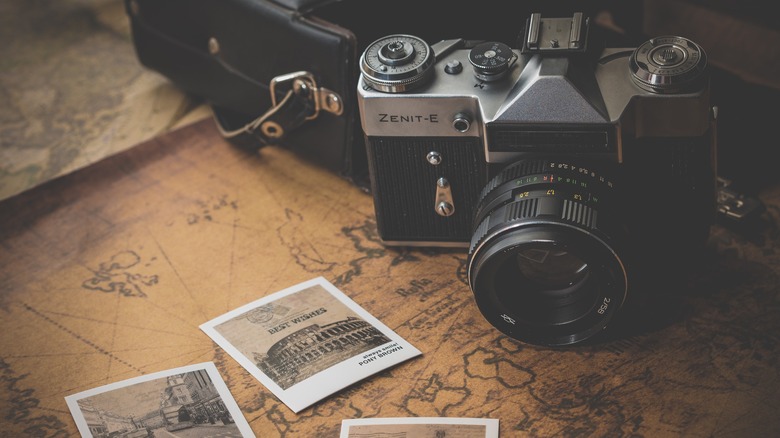 Vintage photos next to map